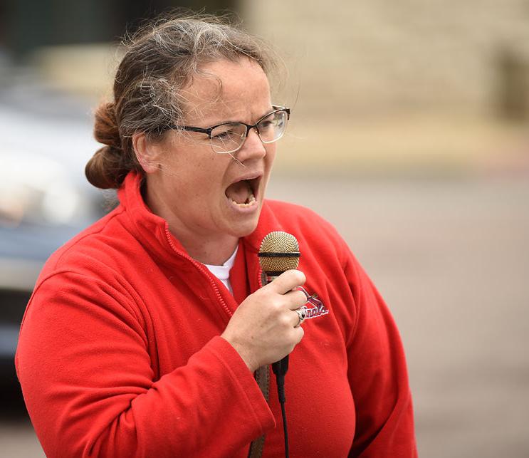 Lyra Noce speaks to the crowd gathered in downtown Columbia